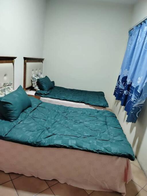 Homestay Elina - Cheap And Cosy Port Dickson Exteriör bild